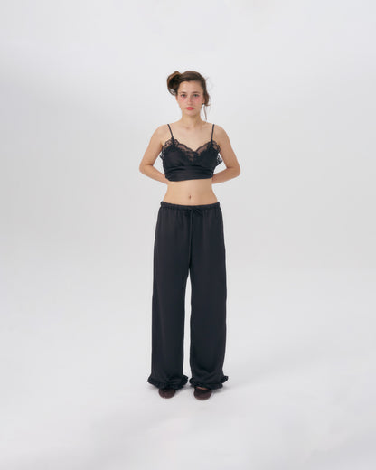 SATIN PANTS WITH RUFFLE HEM (BLACK)