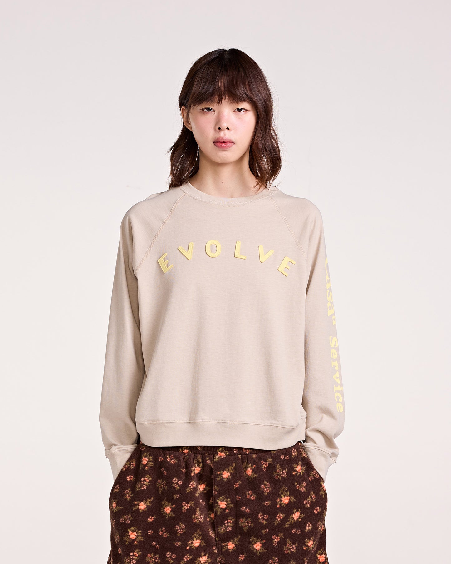 EVOLVE RAGLAN TOP (CREAM)